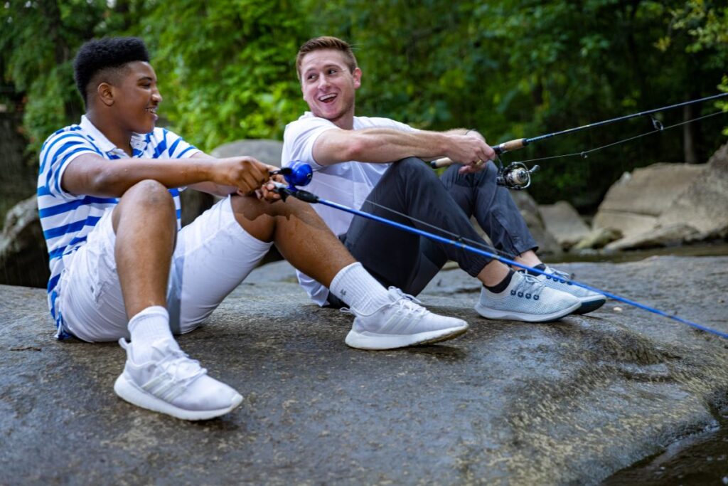 Big and Little interacting outside, Big Brothers Big Sisters mentoring